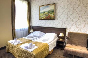Фото номера Двухместный номер Делюкс с 2 отдельными кроватями Отель Hotel i Restauracja Nad Jeziorem г. Члухув 8